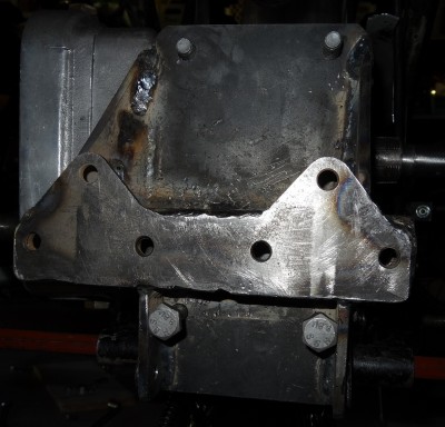 Fixture between gearbox and rear side of engine.<br />Made of 4mm and 5.6 mm steel plate and square tube, weight 2.5 kg