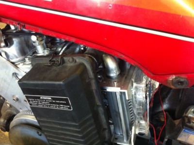 The only air filter that will fit and look ok  is the old axiam unit . It's all a bit condensed around the radiator area