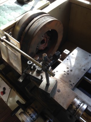 enfield robin flywheel on lathe.JPG