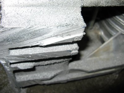 I'll need to clean up the cuts. I have a sheet of steel to which I'll glue sheets of emery cloth.  Then just "scrub scrub scrub" the cut face until it is flat and even.