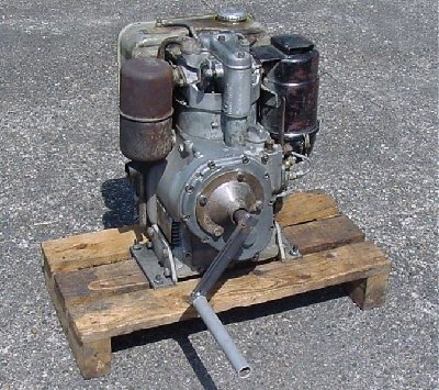 Note: This doesn't have the original crank in the picture, it looks homemade, and the crank is removed after starting. This engine also appears to be a bit smaller than the one I have