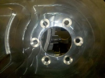 Bolted horizontal position interferes with the case. It also is very close to the foot peg.