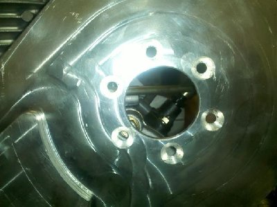 Floating position would require new mounting holes but it interferes with case and fuel line.