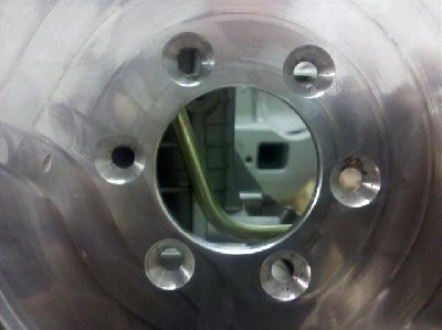 Bolted position interferes with the cylinder.